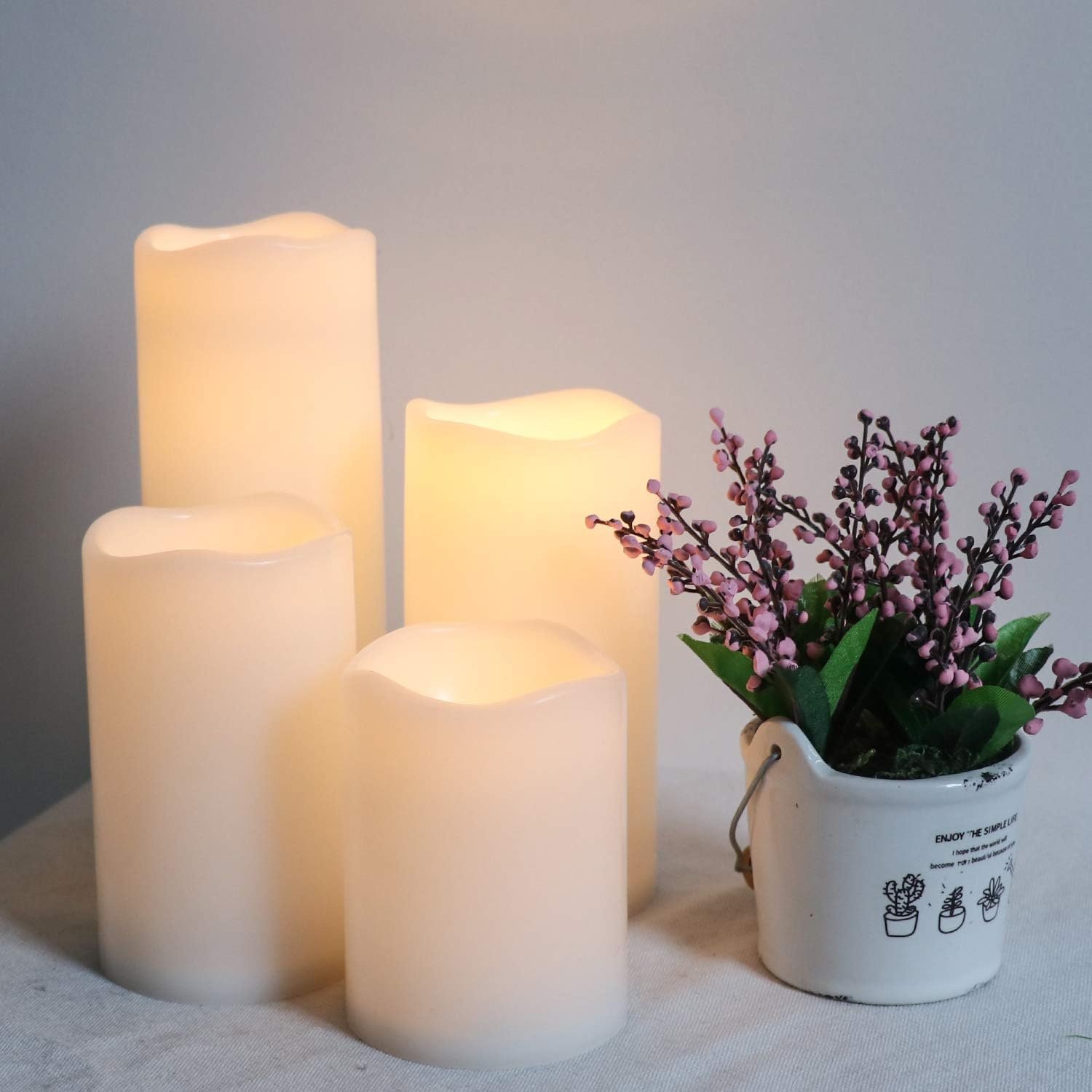 Eldnacele Waterproof Flameless Flickering Candles with 6 Hours Timer, Indoor Outdoor White LED Plastic Battery Operated Pillar Candles Pack of 4 Wedding Dinner Home Decor, D3”x H4” 5” 6” 8” - Image 8